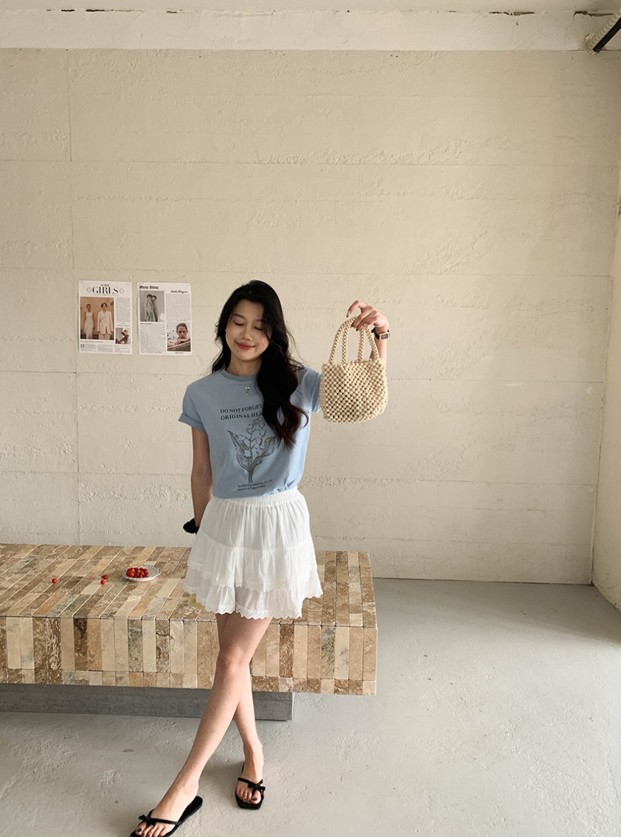 ボタニカルプリントTシャツ